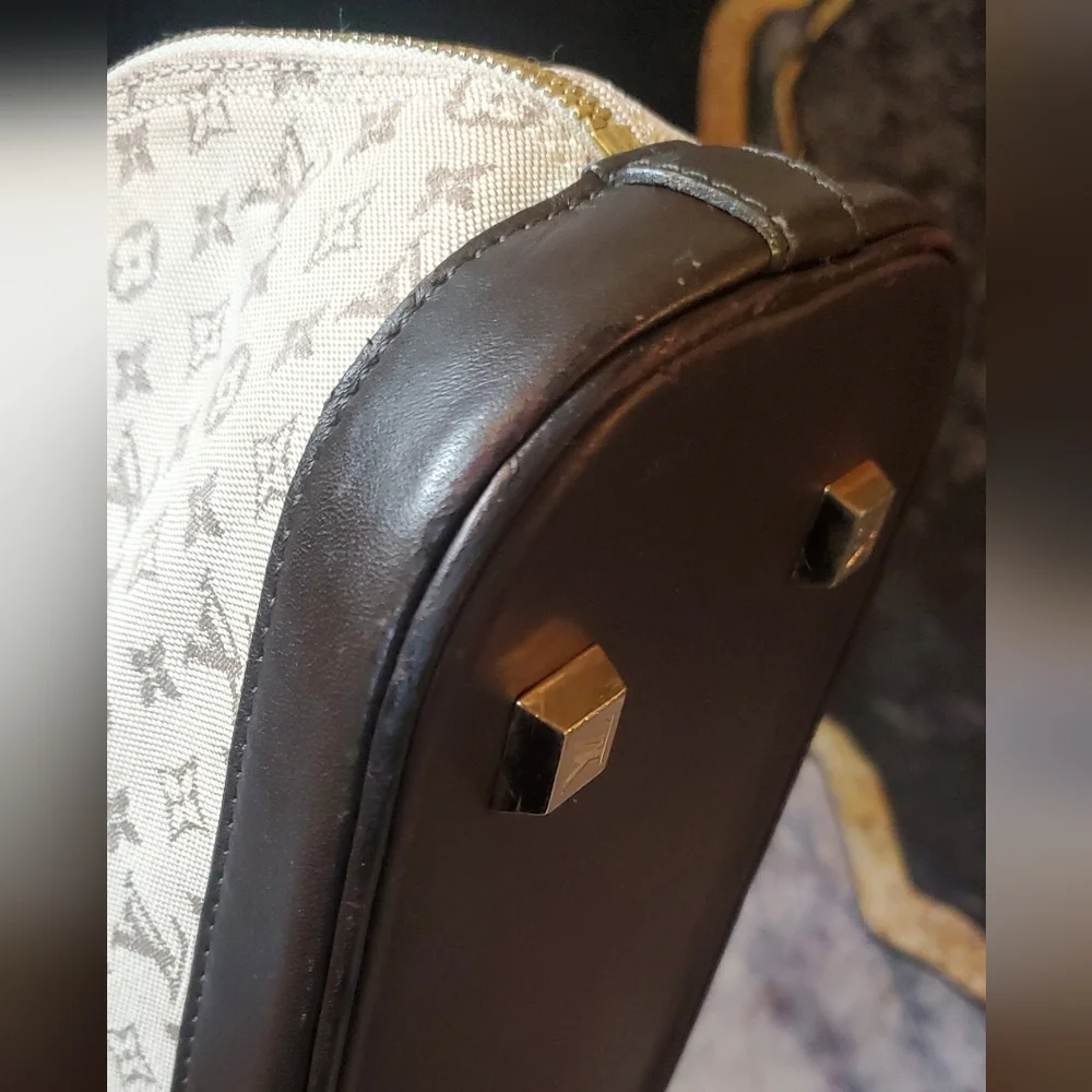 Louis Vuitton Alma Brown Mini Lin Monogram Handbag